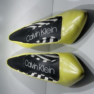 Calvin Klein yellow high heels.